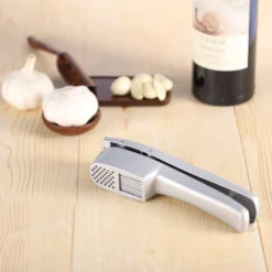 2 In 1 Knoblauchpresse Zerkleinerungsmaschine Und Knoblauchscheibenfunktion Crush -Leonardo Verkäufe 44de40aa34435eb5dc02d75bae95005b